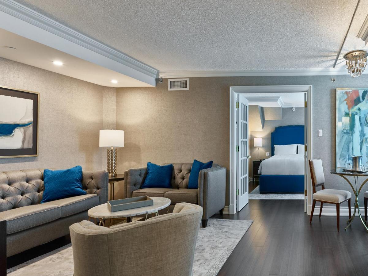 Chateau Vaudreuil Bagian luar foto A suite at the Ritz-Carlton, Boston