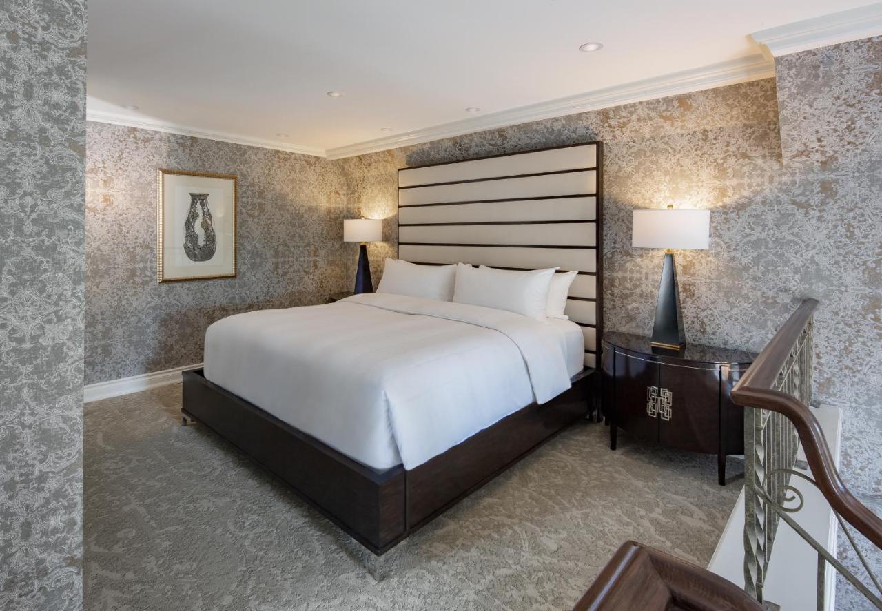 Chateau Vaudreuil Bagian luar foto A bedroom at the Four Seasons Hotel