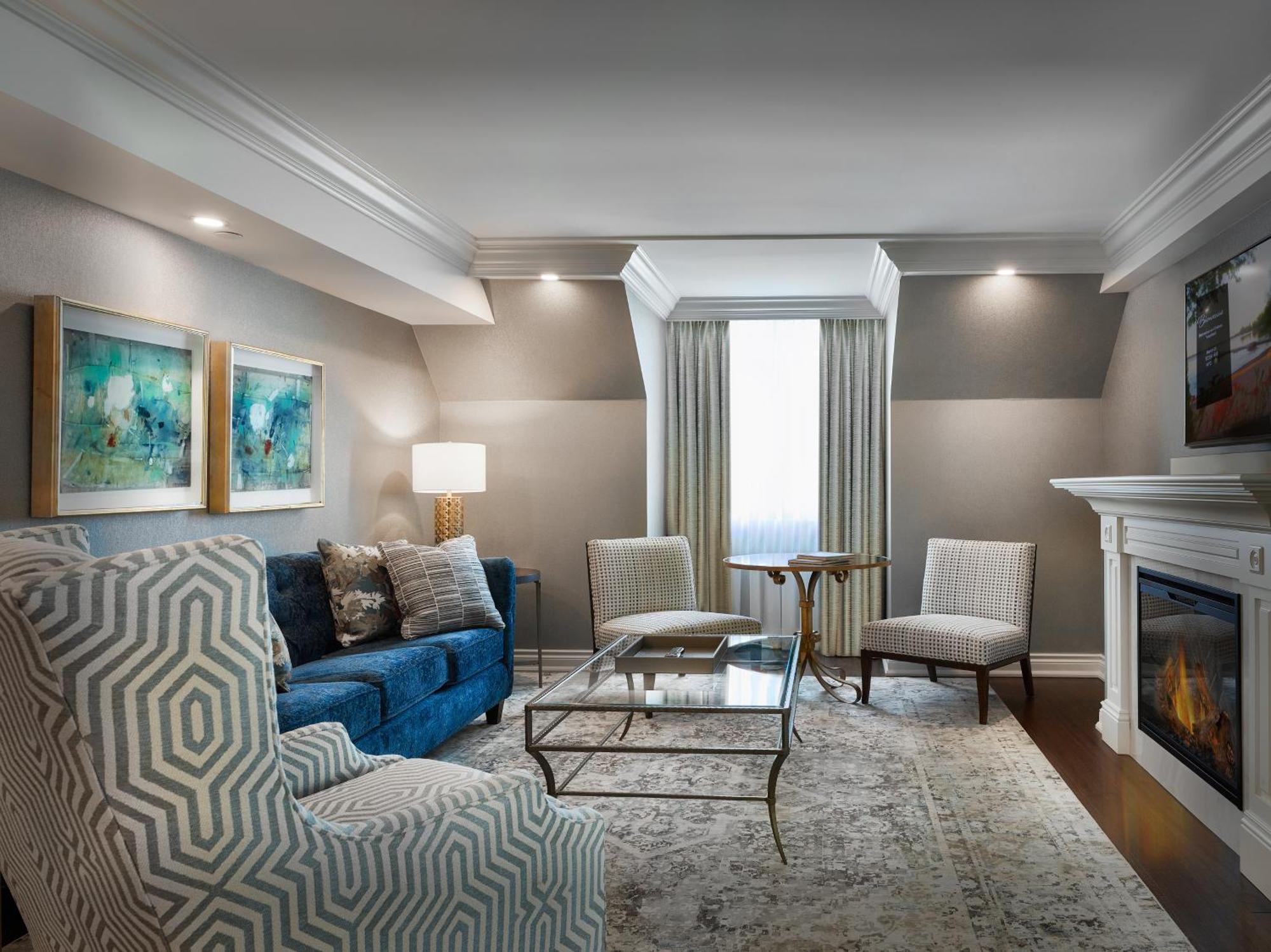 Chateau Vaudreuil Bagian luar foto A living room at the hotel